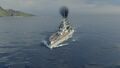 A bow view of Queen Elizabeth as she trains her forward turrets to port.