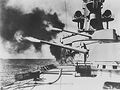 De Ruyter firing her guns during gunnery training.