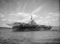 Implacable at anchor at Greenock in camouflage, 14 June 1944