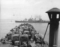Boise fires on enemy forces near Gela, Sicily, 11 July 1943. Photo taken from aboard LST-325.