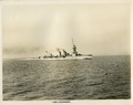 Caledon-class light cruiser HMS Cassandra underway at sea.
