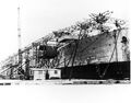 Langley being converted from a collier to an aircraft carrier at Norfolk Naval Shipyard in 1921.
