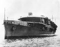 Oblique view of Furious at anchor before her armament was installed. Her retractable charthouse is prominent at the forward end of the flight deck.