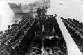 Polish sailors raise the Polish flag on Danae’s transfer to the Polish Navy.