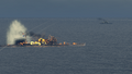 Monarch eliminates an enemy Atago.