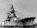 Richelieu at Dakar, in 1941. There were three fire control directors atop the fore tower, and neutrality tricolor bands on Turret B.