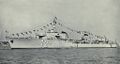 Le Terrible at anchor with signals strung from her masts.