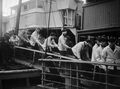 Survivors from Scharnhorst disembarking in Scapa Flow.